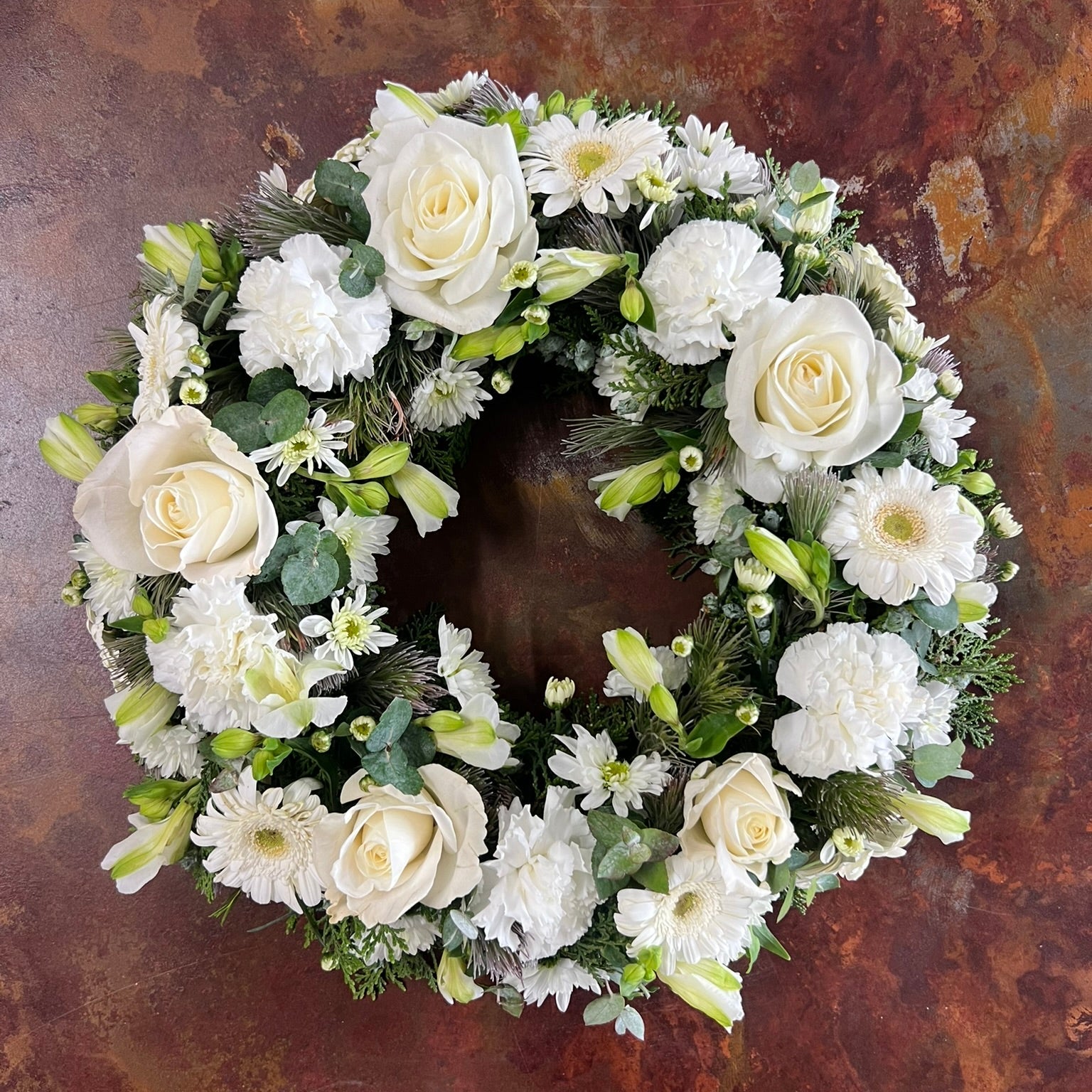 white floral sympathy wreath